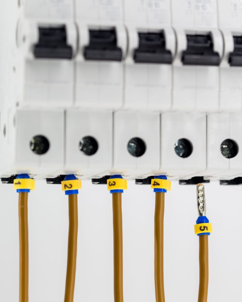 electric machines, switches, isolated on white background, close-up, connect marker cable to the device